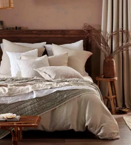 Cosy bedroom with linen store bedding for winter wellness