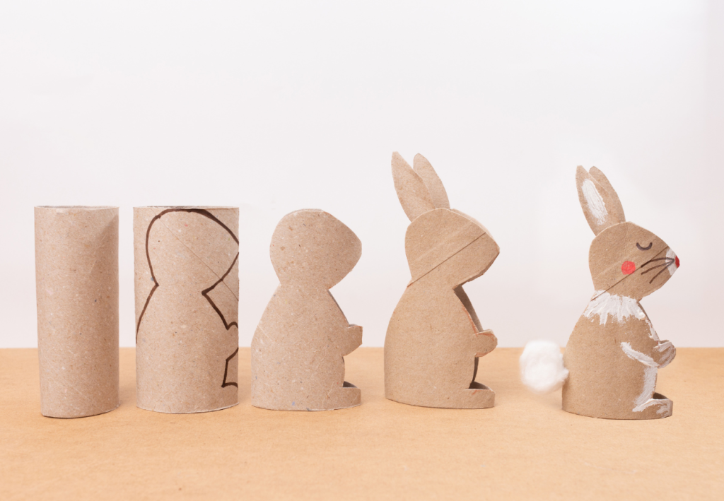 Step-by-step transformation of an empty toilet paper roll into an adorable Easter rabbit, showcasing creative recycling ideas for post-Easter sustainability.