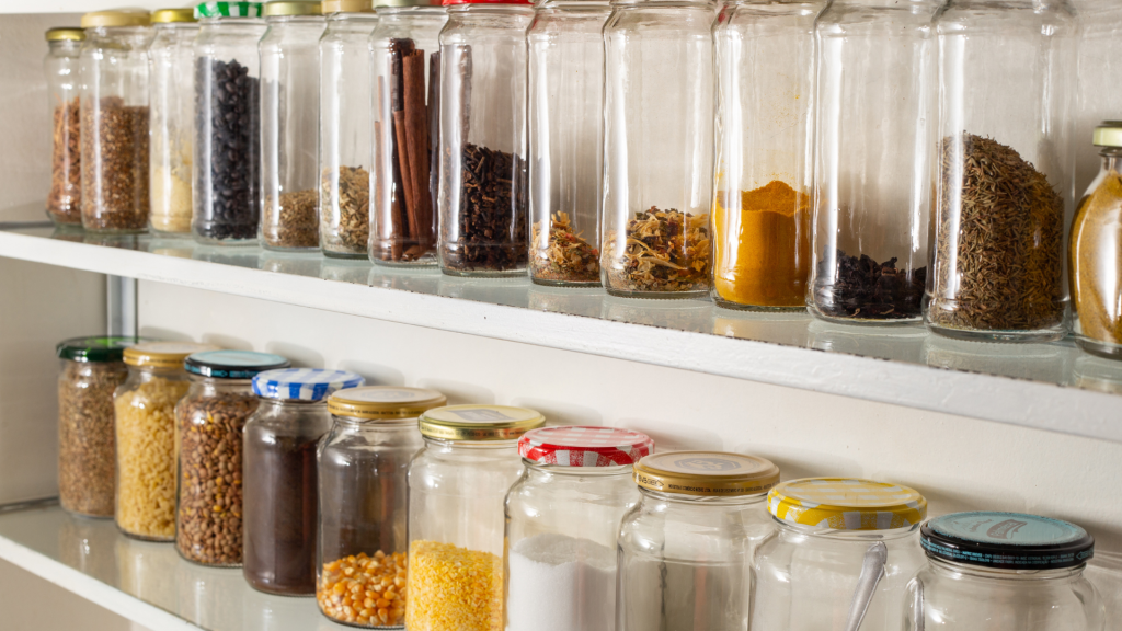 Glass Jars filled with kitchen staples such as beans, rice and lentils